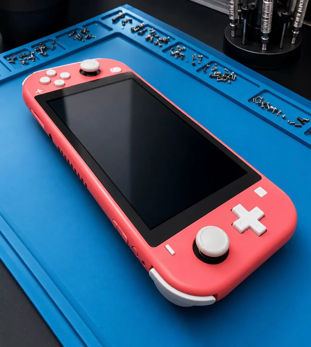 Nintendo Switch Lite en réparation à l'atelier